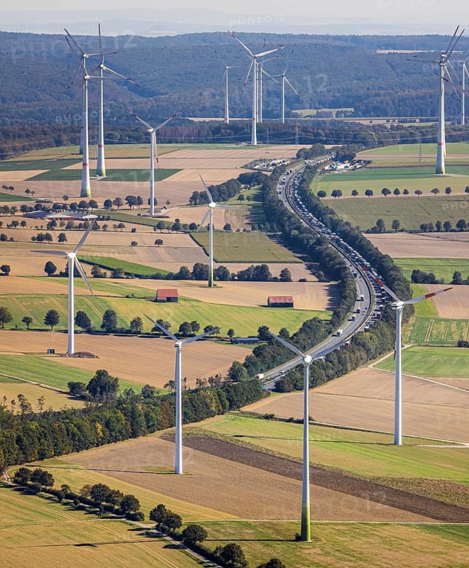 Aerial view, wind turbines, motorway A44, motorway service area Sintfeld, Wewelsburg, Büren, Ostwestfalen-Lippe, North Rhine-Westphalia, Germany, motorway service area, Bad Wünnenberg, DE, energy, energy industry, Europe, distant view, aerial view, aerial photography, aerial photography, OLWBUCH, OWL, OWL-Buch, Ostwestfalen, electricity, overview, bird's-eye view, WEA, meadows and fields, wind energy, wind energy plant, wind farm, wind power, wind power plant, wind park, birds-eyes view, overview