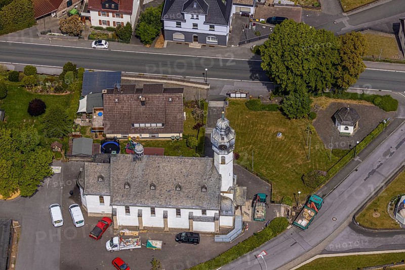 Aerial view, St. Nicholas Catholic Church, Beckum, Balve, Sauerland, North Rhine-Westphalia, Germany, place of worship, DE, Europe, religious community, place of worship, property tax, real estate, church, parish, denomination, aerial photograph, aerial photography, aerial photography, overview, bird's-eye view, living and life, residential area, residential buildings, quality of life, housing estate, birds-eyes view, overview