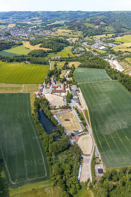 Aerial view, equestrian centre Reiterverein Balve, Schloss Wocklum, Balve, Sauerland, North Rhine-Westphalia, Germany, DE, Europe, manor house, manor house, manor building, courtyard, aerial view, aerial photography, aerial photography, horses, equestrian sports, equestrian centre, riding stable, riding club, riding stable, castle, castle garden, overview, defence system, bird's eye view, forest area, moated castle, moated castle, meadows and fields, Wocklum, birds-eyes view, overview
