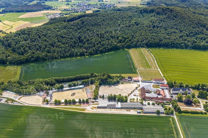 Aerial view, equestrian centre Reiterverein Balve, Schloss Wocklum, Balve, Sauerland, North Rhine-Westphalia, Germany, DE, Europe, manor house, manor house, manor building, courtyard, aerial view, aerial photography, aerial photography, horses, equestrian sports, equestrian centre, riding stable, riding club, riding stable, castle, castle garden, overview, defence system, bird's eye view, forest area, moated castle, moated castle, meadows and fields, Wocklum, birds-eyes view, overview