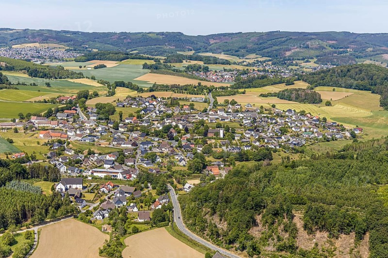 Aerial view, view of Langenholthausen, Goldbäckerei Grote GmbH, Sunderner Straße, St. Johannes Kirche Langenholthausen, Balve, Sauerland, North Rhine-Westphalia, Germany, place of worship, DE, Europe, commercial enterprises, commercial area, commercial location, commercial use, religious community, place of worship, Grote bakery, church, parish, denomination, aerial view, aerial photography, aerial photography, overview, bird's-eye view, birds-eyes view, overview, Langenholthausen