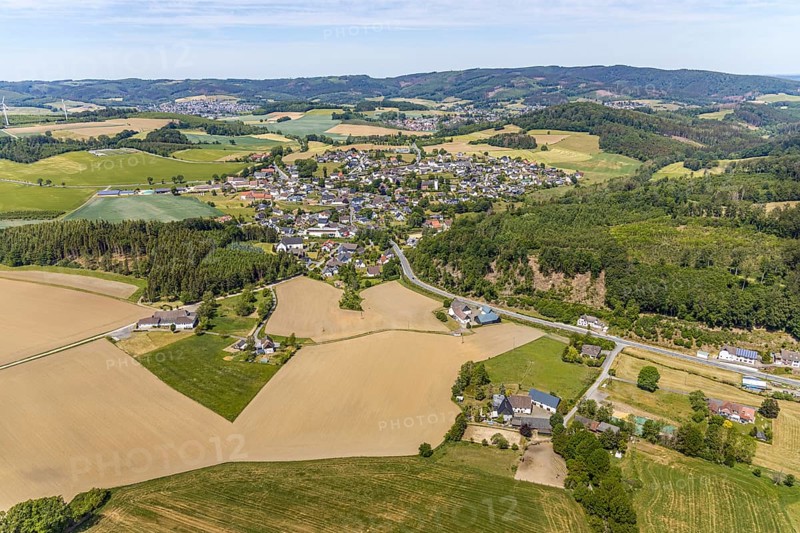 Aerial view, view of Langenholthausen, Goldbäckerei Grote GmbH, Sunderner Straße, St. Johannes Kirche Langenholthausen, Balve, Sauerland, North Rhine-Westphalia, Germany, place of worship, DE, Europe, commercial enterprises, commercial area, commercial location, commercial use, religious community, place of worship, Grote bakery, church, parish, denomination, aerial view, aerial photography, aerial photography, overview, bird's-eye view, birds-eyes view, overview, Langenholthausen