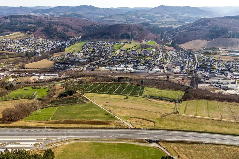 Aerial view, motorway A46 rest area Nuttlar, with view of Bestwig, Bestwig, North Rhine-Westphalia, Germany, motorway A46 extension, railway station, Bestwig Hbf, DE, Europe, shapes and colours, hilly landscape, aerial view, aerial photography, aerial photography, rest area, Sauerland, overview, bird's-eye view, forest area, birds-eyes view, overview