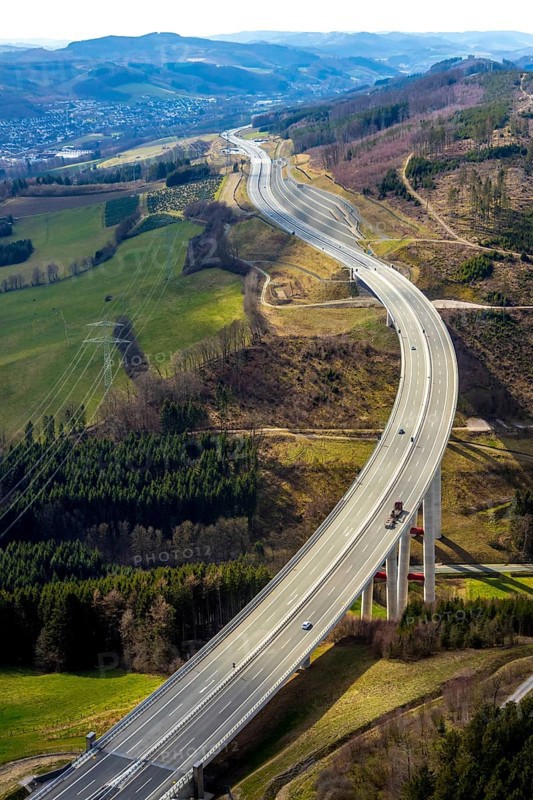 Aerial view, valley bridge Nuttlar, motorway A46, local view Nuttlar, hilly landscape, Bestwig, North Rhine-Westphalia, Germany, motorway A46 extension, motorway bridge, bridge, DE, Europe, aerial view, aerial photography, aerial photography, Rüthener Straße, Sauerland, valley bridge, overview, bird's-eye view, forest area, birds-eyes view, overview