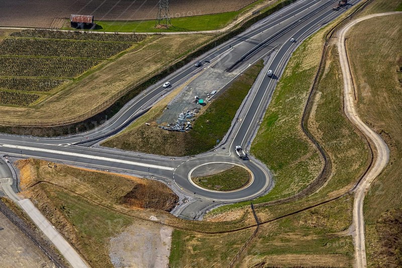 Aerial view, motorway A46, Nuttlar junction B480n, hilly landscape, Bestwig, North Rhine-Westphalia, Germany, motorway A46 extension, motorway bridge, bridge, federal road B480n, DE, Europe, roundabout, aerial view, aerial photography, aerial photography, Nuttlar, Rüthener Straße, Sauerland, viaduct, overview, bird's eye view, forest area, birds-eyes view, overview
