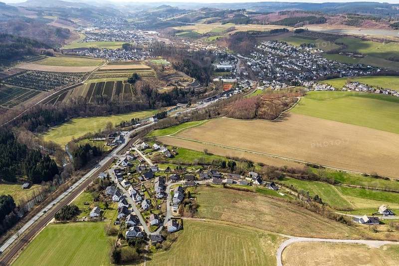 Aerial view, local view Dümel, federal road B7, slag heap former mine Ostwig, local view Nuttlar, Bestwig, North Rhine-Westphalia, Germany, motorway A46 extension, visitor mine slate mine Nuttlar, DE, Europe, property tax, real estate, aerial view, aerial photography, aerial photography, Sauerland, overview, bird's-eye view, forest area, meadows and fields, residential area, living and life, residential area, residential buildings, residential quality, housing estate, birds-eyes view, overview
