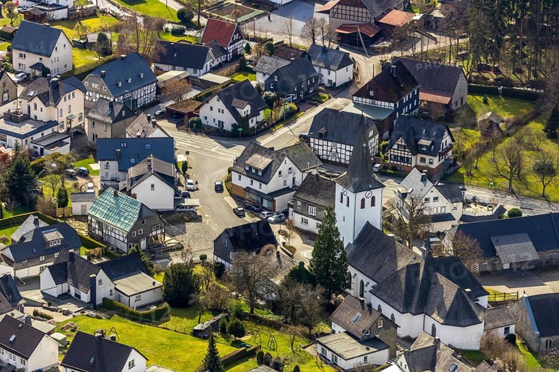 Aerial view, local view Ostwig, St. Joseph Church Ostwig, Bestwig, North Rhine-Westphalia, Germany, DE, Europe, half-timbered houses, religious community, place of worship, property tax, real estate, church, parish, denomination, aerial photograph, aerial photography, aerial photography, religion, overview, bird's-eye view, residential area, residential area, residential buildings, housing estate, birds-eyes view, overview