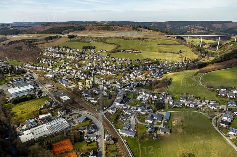 Aerial view, aerial view Nuttlar, valley bridge Nuttlar, motorway A46, Bestwig, North Rhine-Westphalia, Germany, federal road B7, DE, Europe, religious community, place of worship, property tax, hilly landscape, real estate, church, parish, denomination, aerial view, aerial photography, aerial photography, religion, overview, bird's eye view, forest, meadows and fields, living and life, residential area, residential buildings, birds-eyes view, catholic church St. Anna Nuttlar, overview
