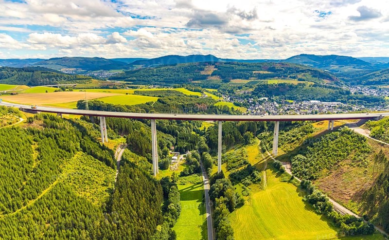 Aerial view, Nuttlar viaduct, motorway A46, Bestwig, Sauerland, North Rhine-Westphalia, Germany, view to Nuttlar, bridge, DE, Europe, hilly landscape, aerial view, aerial photography, aerial photography, Rüthener Straße, Nuttlar viaduct A46, overview, bird's-eye view, forest, forest area, meadows and fields, birds-eyes view, overview