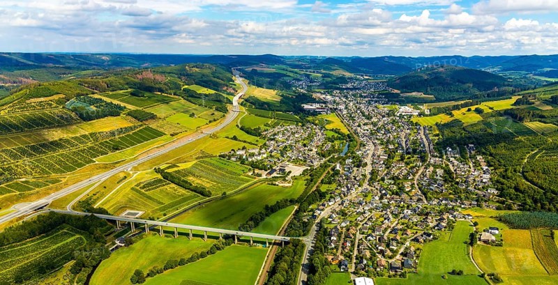 Aerial view, Ruhr valley bridge Velmede, valley bridge Schormecke, river Ruhr, motorway A46, view of Velmede and Borghausen in Bestwig, Sauerland, North Rhine-Westphalia, Germany, motorway bridge, Bestwig, bridge, DE, Europe, distant view, hilly landscape, aerial view, aerial photography, aerial photography, overview, bird's-eye view, forest area, meadows and fields, birds-eyes view, overview