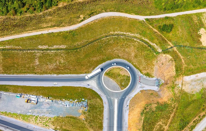 Aerial view, motorway A46, Nuttlar junction B480n, hilly landscape, Bestwig, North Rhine-Westphalia, Germany, motorway A46 extension, construction work, construction area, construction site, construction measure, construction project, construction site, federal road B480n, DE, Europe, roundabout, aerial view, aerial photography, aerial photography, new construction, Nuttlar, Sauerland, overview, bird's eye view, forest area, meadows and fields, birds-eyes view, overview