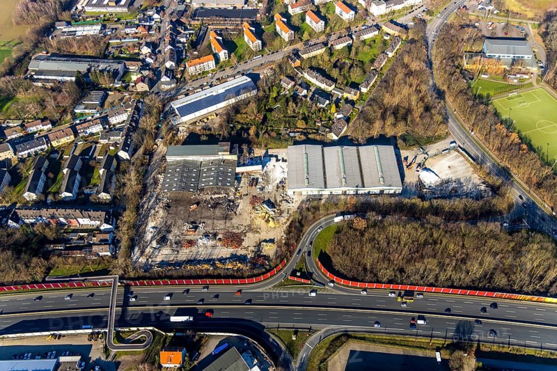 Aerial view, demolition of former factory halls Aquella Getränke Vertrieb, Berliner Straße, planned DIY store with garden centre, motorway A40, junction Wattenscheid-West, Leithe, Bochum, Ruhr area, North Rhine-Westphalia, Germany, demolition, demolition work, DE, Europe, aerial view, aerial photography, aerial photography, overview, bird's-eye view, planned DIY store, overview