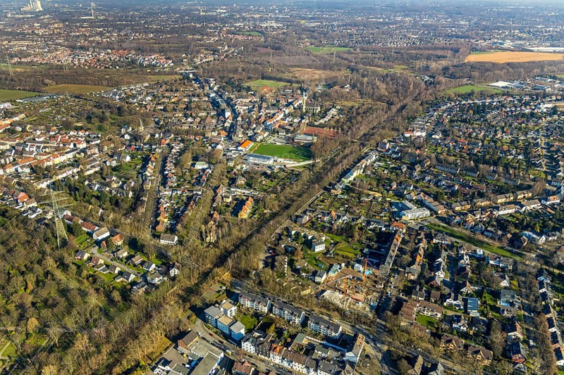 Aerial view, planned cycle path on former railway line, local view Günnigfeld, road subway Parkstraße Aschenbruch, Günnigfeld, Bochum, Ruhr area, North Rhine-Westphalia, Germany, railway tracks, DE, Europe, property tax, real estate, Herz Mariä church, aerial view, aerial photography, aerial photography, VfB Günnigfeld sports ground, tunnel, overview, subway, residential complex, living and life, residential area, residential buildings, housing estate, housing estate bird's eye view, birds-eyes view, overview