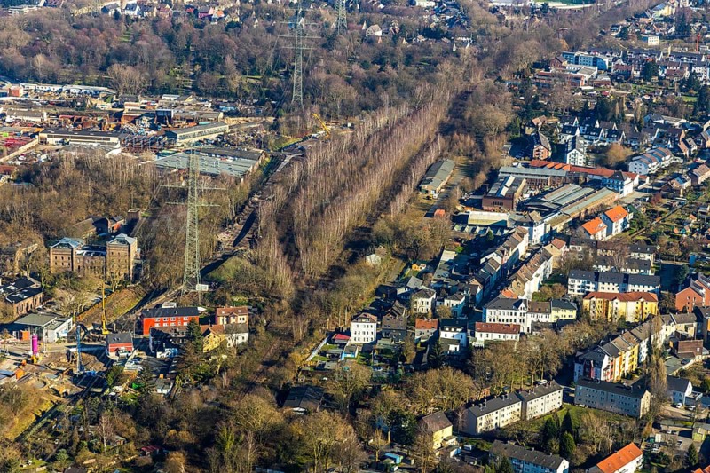 Aerial view, planned cycle path on former railway line, local view Ückendorf, former goods station Gelsenkirchen / Wattenscheid, road subway Ückendorfer Straße, Am Bahnhof, Günnigfeld, Bochum, Ruhr area, North Rhine-Westphalia, Germany, railway tracks, DE, Europe, property tax, real estate, aerial view, aerial photography, aerial photography, tunnel, overview, subway, forest, housing estate, living and living, residential area, residential buildings, housing estate, housing estate bird's eye view, birds-eyes view, overview, Ückendorf