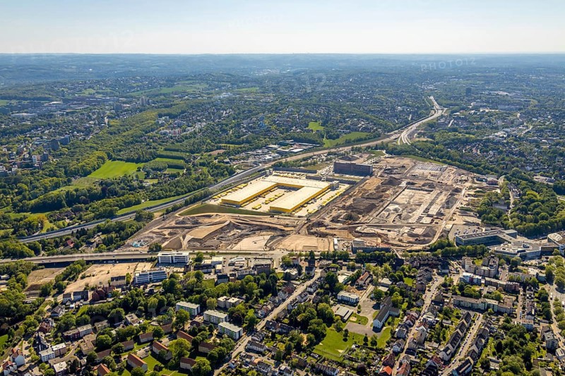 Aerial view, new construction DHL logistics parcel centre, former Opel site, former Opel administration building, Laer district, Bochum, Ruhr area, North Rhine-Westphalia, Germany, expansion areas, A448 motorway, construction, construction area, construction site, construction project, construction site, DE, DHL, DHL logistics, DHL parcel centre, earthworks, Renewal, development, Europe, distant view, Mark 51/7 industrial estate, capacity requirements, logistics, aerial view, aerial photography, aerial photography, new build, Opel site, Opelring 1, overview, bird's-eye view, growth, becoming and growing, birds-eyes view, former Opel site with old administration building, overview
