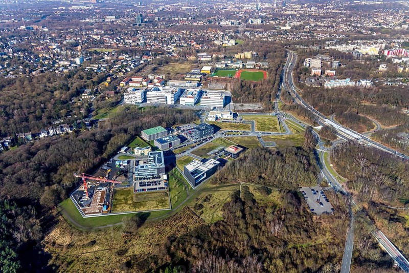 Aerial view, Health Campus North and Health Campus South, construction site, Querenburg, Bochum, Ruhr area, North Rhine-Westphalia, Germany, AKAFÖ student residence Grimberg, DE, Europe, Health Campus, Health Campus North, health science, commercial area, commercial park, commercial use, North Rhine-Westphalia Health Centre, aerial view, aerial photography, aerial photography, Markstraße sports facility, overview, Universitätsstraße, bird's-eye view, forest area, residential area, birds-eyes view, overview