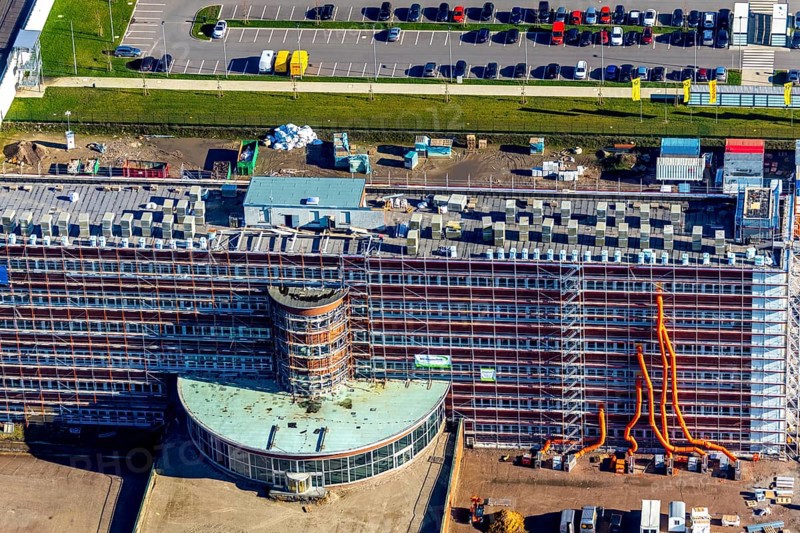 Aerial view, MARK 51Â°7 industrial estate, former Opel site with old administration building, Laer, Bochum, Ruhr area, North Rhine-Westphalia, Germany, expansion areas, construction, construction area, construction site, construction project, construction site, DEU, monument protection, earthworks, renewal, development, Europe, Mark 51/7 industrial estate, capacity requirements, logistics, aerial view, aerial photography, aerial photography, new build, Opel site, Opelring 1, overview, administration, bird's-eye view, growth, becoming and growing, birds-eyes view, overview
