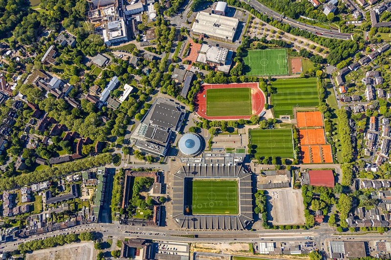 Aerial photo, Vonovia Ruhrstadion an der Castroper Straße, football stadium, Bochum, Ruhr area, North Rhine-Westphalia, Germany, arena, Bundesliga stadium, DE, Europe, football pitch, football club, hotel, congress centre, aerial photo, aerial photography, aerial photography, Renaissance Bochum Hotel, RuhrCongress Bochum, Rundsporthalle Bochum, sports, sports facilities, sports field, sports facility, sports club, stadium, stadium ring, tennis courts, training grounds, overview, VFL Bochum 1848, bird's-eye view, Vonovia, competition, birds-eyes view, overview