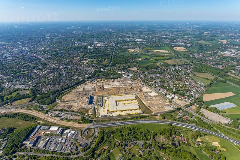 Aerial view, new construction DHL logistics parcel centre, former Opel site, former Opel administration building, Laer district, Bochum, Ruhr area, North Rhine-Westphalia, Germany, expansion areas, A448 motorway, construction, construction area, construction site, construction project, construction site, DE, DHL, DHL logistics, DHL parcel centre, earthworks, Renewal, development, Europe, Mark 51/7 industrial estate, capacity requirements, logistics, aerial view, aerial photography, aerial photography, new build, Opel site, Opelring 1, overview, bird's-eye view, growth, becoming and growing, birds-eyes view, former Opel site with old administration building, overview