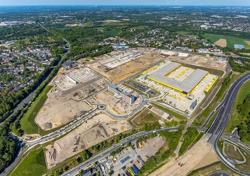 Aerial view, new construction DHL logistics parcel centre, former Opel site, former Opel administration building, Laer district, Bochum, Ruhr area, North Rhine-Westphalia, Germany, expansion areas, A448 motorway, construction, construction area, construction site, construction project, construction site, DE, DHL, DHL logistics, DHL parcel centre, earthworks, Renewal, development, Europe, Mark 51/7 industrial estate, capacity requirements, logistics, aerial view, aerial photography, aerial photography, new build, Opel site, Opelring 1, overview, bird's-eye view, growth, becoming and growing, birds-eyes view, former Opel site with old administration building, overview