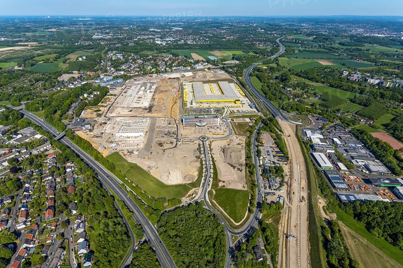 Aerial view, new construction DHL logistics parcel centre, former Opel site, former Opel administration building, Laer district, Bochum, Ruhr area, North Rhine-Westphalia, Germany, expansion areas, A448 motorway, construction, construction area, construction site, construction project, construction site, DE, DHL, DHL logistics, DHL parcel centre, earthworks, Renewal, development, Europe, Mark 51/7 industrial estate, capacity requirements, logistics, aerial view, aerial photography, aerial photography, new build, Opel site, Opelring 1, overview, bird's-eye view, growth, becoming and growing, birds-eyes view, former Opel site with old administration building, overview