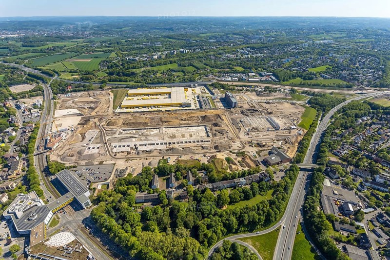 Aerial view, new construction DHL logistics parcel centre, former Opel site, former Opel administration building, Laer district, Bochum, Ruhr area, North Rhine-Westphalia, Germany, expansion areas, A448 motorway, construction, construction area, construction site, construction project, construction site, DE, DHL, DHL logistics, DHL parcel centre, earthworks, Renewal, development, Europe, distant view, Mark 51/7 industrial estate, capacity requirements, logistics, aerial view, aerial photography, aerial photography, new build, Opel site, Opelring 1, overview, bird's-eye view, growth, becoming and growing, birds-eyes view, former Opel site with old administration building, overview