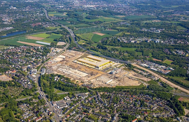 Aerial view, new construction DHL logistics parcel centre, former Opel site, former Opel administration building, Laer district, Bochum, Ruhr area, North Rhine-Westphalia, Germany, expansion areas, A448 motorway, construction, construction area, construction site, construction project, construction site, DE, DHL, DHL logistics, DHL parcel centre, earthworks, Renewal, development, Europe, distant view, Mark 51/7 industrial estate, capacity requirements, logistics, aerial view, aerial photography, aerial photography, new build, Opel site, Opelring 1, overview, bird's-eye view, growth, becoming and growing, birds-eyes view, former Opel site with old administration building, overview