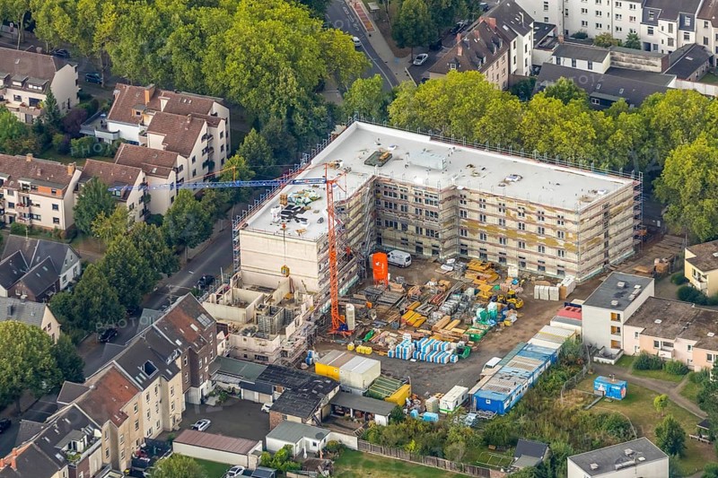 Aerial view, residential quarter with care facility Am Beisenkamp, Wattenscheid, Bochum, Ruhr area, North Rhine-Westphalia, Germany, construction work, building, building area, building site, building plots, building crane, construction project, building site, Bochum-Wattenscheid, DE, Europe, property tax, green trees, real estate, capacity requirements, Koschany und Zimmer Architekten KZA, aerial view, aerial photography, aerial photography, new building, Parkstraße, Wattenscheid district, overview, bird's-eye view, growth, becoming and growing, housing estate, living and living, residential area, residential buildings, residential quality, residential neighbourhood, housing estate, birds-eyes view, overview
