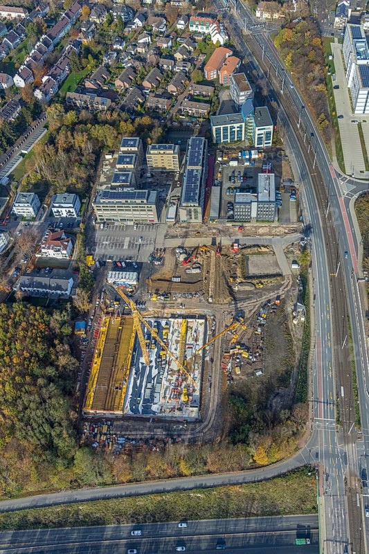 Police Bochum police station south-east, construction site new building residential neighbourhood Seven Stones, Universitätsstraße, Bochum, North Rhine-Westphalia, Germany, 7 Stones, construction work, construction, construction area, building site, building plots, construction project, construction site, DE, Europe, real estate, climate protection settlement, aerial photograph, aerial photo, aerial photography, aerial photography, apartment buildings, new construction, photovoltaics, Ruhr area, Seven Stones, solar plant, solar energy, overview, bird's-eye view, housing estate, housing and living, residential buildings, residential neighbourhood, residential neighbourhood Seven Stones Bochum, housing estate, housing shortage, birds-eyes view, overview