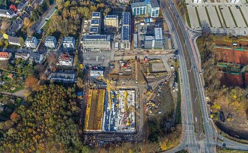 Police Bochum police station south-east, construction site new building residential neighbourhood Seven Stones, Universitätsstraße, Bochum, North Rhine-Westphalia, Germany, 7 Stones, construction work, construction, construction area, building site, building plots, construction project, construction site, DE, Europe, real estate, climate protection settlement, aerial photograph, aerial photo, aerial photography, aerial photography, apartment buildings, new construction, photovoltaics, Ruhr area, Seven Stones, solar plant, solar energy, overview, bird's-eye view, housing estate, housing and living, residential buildings, residential neighbourhood, residential neighbourhood Seven Stones Bochum, housing estate, housing shortage, birds-eyes view, overview