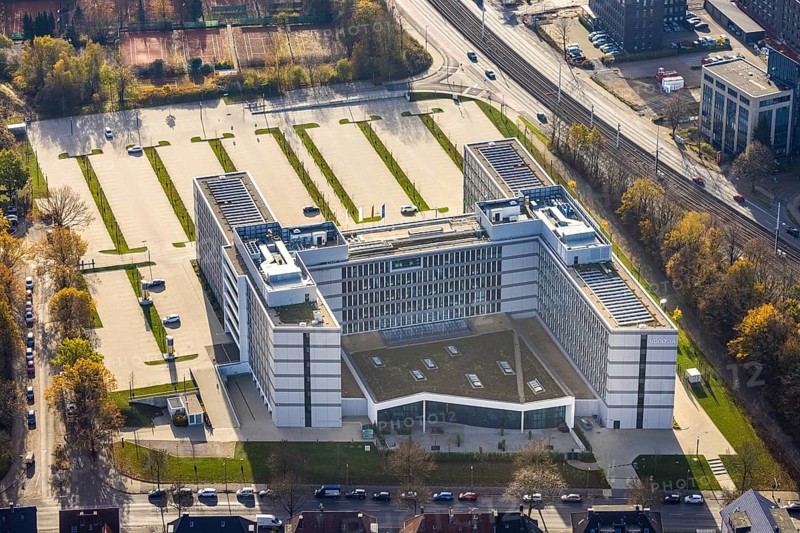 New office and commercial building Vonovia headquarters, Universitätsstraße, Bochum, North Rhine-Westphalia, Germany, DE, Europe, commercial buildings, real estate, aerial view, aerial photography, aerial photography, aerial photography, car parks, photovoltaics, Ruhr area, solar system, solar energy, tennis courts, overview, bird's eye view, Vonovia, living and living, residential buildings, housing provider, housing construction company, housing service provider, housing shortage, birds-eyes view, overview