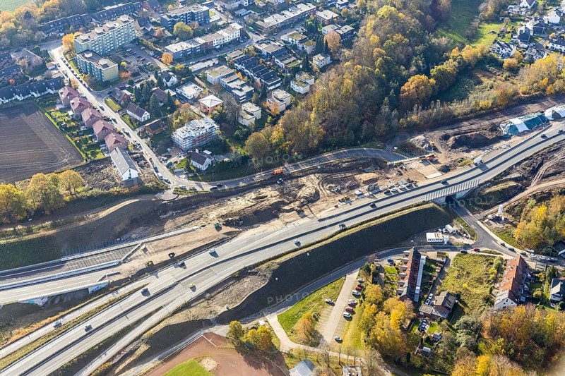 Construction of the feeder road from the A44 now 448 to the Nordhausen-Ring district of Laer, Bochum, North Rhine-Westphalia, Germany, construction, construction site, construction project, construction site, DE, renewal, development, Europe, property tax, green trees, dog sports club, real estate, aerial photograph, aerial photograph, aerial photography, aerial photography, Nordhausen-Ring, Ruhr area, sports, sports facilities, sports field, sports facility, Steinkuhlstraße, road construction, road traffic, overview, traffic, traffic volume, bird's-eye view, competition, living and life, residential buildings, birds-eyes view, overview