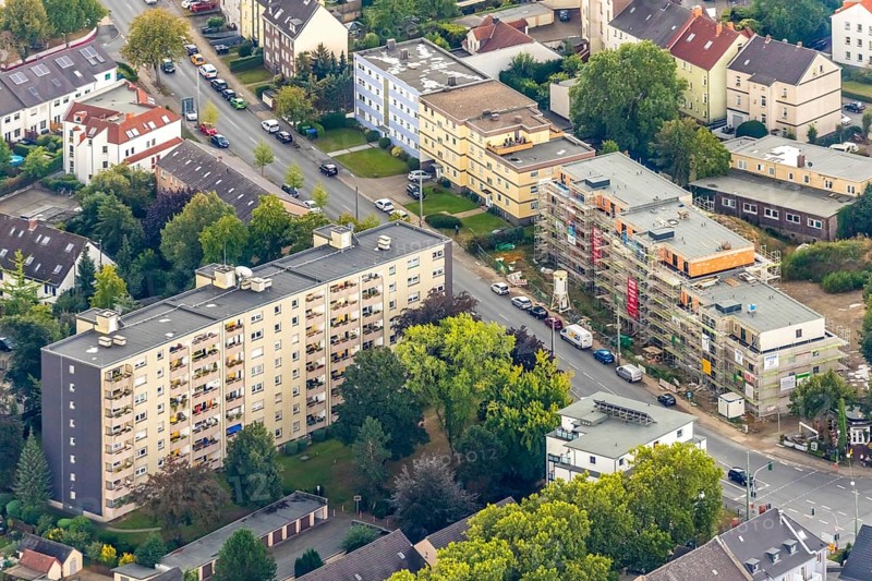 Aerial view, construction site, new residential complex Marienstraße corner Hüllerstraße, Wattenscheid, Bochum, Ruhr area, North Rhine-Westphalia, Germany, construction work, building, construction area, building site, building plots, construction project, construction site, Bochum-Wattenscheid, DE, Europe, property tax, real estate, aerial view, aerial photography, aerial photography, new building, Wattenscheid district, overview, bird's-eye view, housing estate, living and living, residential area, residential buildings, residential quality, residential neighbourhood, housing estate, birds-eyes view, overview