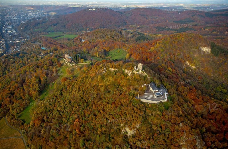 Drachenfels castle ruins with plateau and glass cube, Drachenburg castle in the background, Bad Honnef, Siebengebierge between Königswinter and Bad Honnef, autumn foliage, North Rhine-Westphalia, Germany, Europe, aerial view, birds-eyes view, aerial photography, aerial photography, overview, bird's eye view