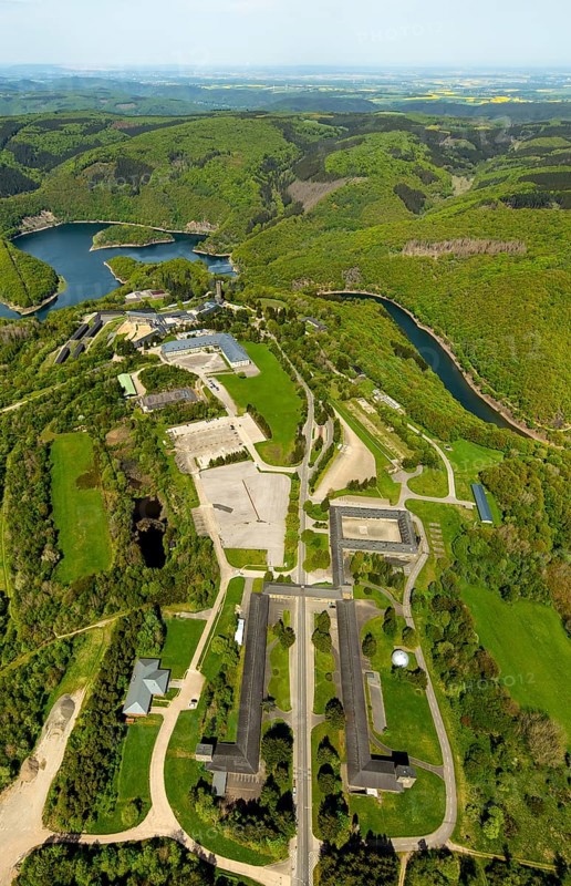 Former Nazi Ordensburg Vogelsang, a building complex erected by the National Socialists on Mount Erpenscheid (1) near Gemünd Eifel above the Urft Dam, Camp Vogelsang former barracks of the Belgian armed forces, Schleiden, Eifel, North Rhine-Westphalia, Germany, Europe, aerial view, birds-eyes view, aerial photography, aerial photography, overview, bird's eye view