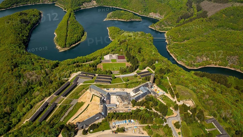 Former Nazi Ordensburg Vogelsang, a building complex erected by the National Socialists on Mount Erpenscheid (1) near Gemünd Eifel above the Urft Dam, Camp Vogelsang former barracks of the Belgian armed forces, Schleiden, Eifel, North Rhine-Westphalia, Germany, Europe, aerial view, birds-eyes view, aerial photography, aerial photography, overview, bird's eye view