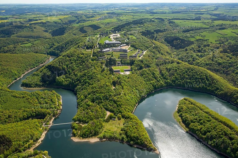 Former Nazi Ordensburg Vogelsang, a building complex erected by the National Socialists on Mount Erpenscheid (1) near Gemünd Eifel above the Urft Dam, Camp Vogelsang former barracks of the Belgian armed forces, Schleiden, Eifel, North Rhine-Westphalia, Germany, Europe, aerial view, birds-eyes view, aerial photography, aerial photography, overview, bird's eye view
