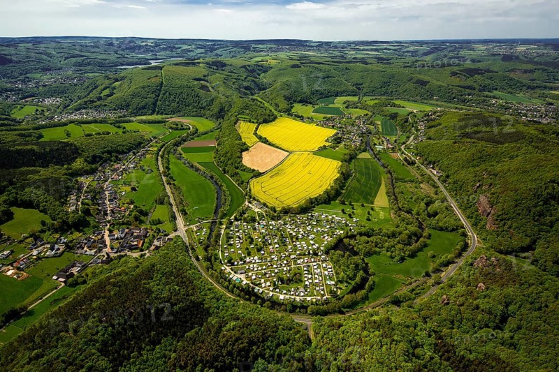 Rurschleife with camping site, agricultural fields and rape fields near Heimbach, Heimbach, Eifel, North Rhine-Westphalia, Germany, Europe, aerial view, birds-eyes view, aerial photography, aerial photography, overview, bird's eye view