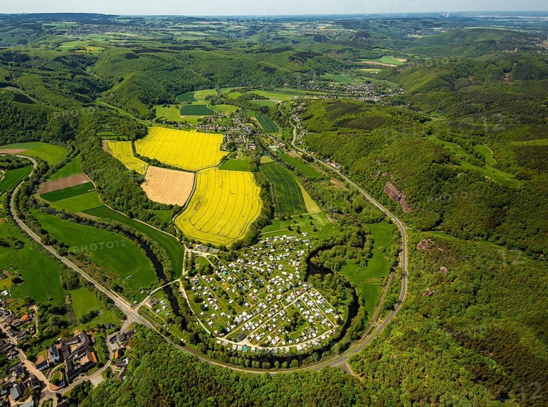 Rurschleife with camping site, agricultural fields and rape fields near Heimbach, Heimbach, Eifel, North Rhine-Westphalia, Germany, Europe, aerial view, birds-eyes view, aerial photography, aerial photography, overview, bird's eye view