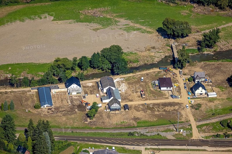 Aerial view, flood area at the river Ahr with construction area in Mühlenauel, Ahrbrück, Ahr flood, Ahr valley, Rhineland-Palatinate, Germany, construction work, construction area, construction site, building plots, construction project, construction site, DE, Europe, property tax, real estate, flood of the century, aerial view, aerial photography, aerial photography, overview, bird's eye view, residential complex, living and living, residential area, residential buildings, birds-eyes view, overview