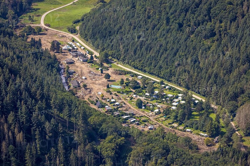 Aerial view, flooded area at the river Ahr and destroyed by flood disaster campsite Sahrtal Ute Vaßmer at the Sahrbach in the district Kreuzberg, Altenahr, Ahr flood, Ahr valley, Rhineland-Palatinate, Germany, camping, camping site, camping houses, camper, campsite, DE, Europe, flood disaster, flood disaster, flood of the century, aerial view, aerial photography, aerial photography, overview, bird's-eye view, motorhome, caravan, birds-eyes view, overview, flooding, flooding, flooded area