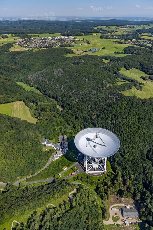 Aerial photograph, Effelsberg radio telescope in the Ahr Mountains in Holzem, Bad Münstereifel, Ahr flood, Ahr Valley, North Rhine-Westphalia, Germany, DE, Eifel part of the Ahr Mountains, Europe, large telescope, hilly landscape, cosmos observation, aerial photograph, aerial photography, aerial photography, Max Planck Institute for Radio Astronomy, radio astronomy, radio telescope, overview, bird's-eye view, forest area, space research, birds-eyes view, overview