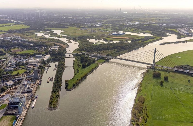 Aerial view, The mouth of the river Lippe into the river Rhine with the Lower Rhine Bridge Wesel at the city harbour in Wesel, Lower Rhine, North Rhine-Westphalia, Germany, federal road B58, DE, Europe, harbour, mouth of the river Lippe, Lippeverband, aerial view, aerial photography, aerial photography, estuary, renaturation of the mouth of the river Lippe, sight, overview, bird's-eye view, Wesel, Weseler Straße, birds-eyes view, overview