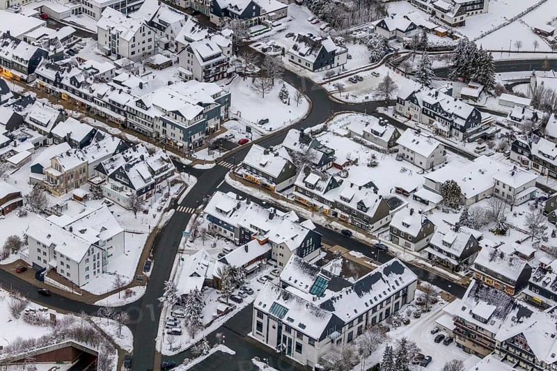 Aerial view of the snowy winter landscape of Winterberg with deserted streets during the corona lockdown in the Sauerland in North Rhine-Westphalia, Germany, Sauerland, Europe, aerial photo, birds-eyes view, aerial photography, aerial photography, overview, bird's eye view, lockdown, closed winter landscape, corona lockdown, deserted, snow, winter weather, corona-related lockdown