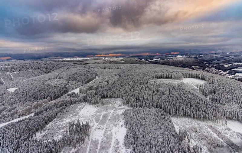 Aerial view of the snowy winter landscape of Winterberg in Sauerland in North Rhine-Westphalia, Germany, Sauerland, Europe, aerial photo, birds-eyes view, aerial photography, aerial photography, overview, bird's eye view, lockdown, closed winter landscape, corona lockdown, deserted, snow, winter weather, corona-related lockdown