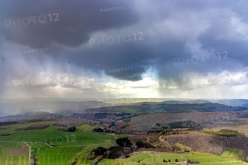 Aerial view, clouds over the forest area near Wilgersdorf, Wilnsdorf, Siegerland, North Rhine-Westphalia, Germany, DE, Europe, hilly landscape, Siegen-Wittgenstein district, aerial view, aerial photography, aerial photography, overview, bird's-eye view, weather phenomena, meadows and fields, cloud formation, birds-eyes view, overview