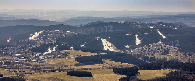Landal Ferienpark Winterberg, Winterberg, Sauerland, North Rhine-Westphalia, Germany, DE, Europe, distant view, hilly landscape, aerial view, aerial photograph, aerial photography, aerial photography, pandemic lockdown, terraced houses, snow remains, overview, bird's eye view, forest area, winter, residential complex, residential park, housing estate, birds-eyes view, overview