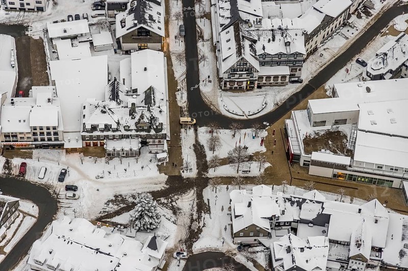 Aerial view of the snowy winter landscape of Winterberg with deserted streets at the market in the centre of Winterberg during the corona lockdown in Sauerland in North Rhine-Westphalia, Germany, Sauerland, Europe, aerial photo, birds-eyes view, aerial photography, aerial photography, overview, bird's eye view, lockdown, closed winter landscape, corona lockdown, deserted, snow, winter weather, corona-related lockdown