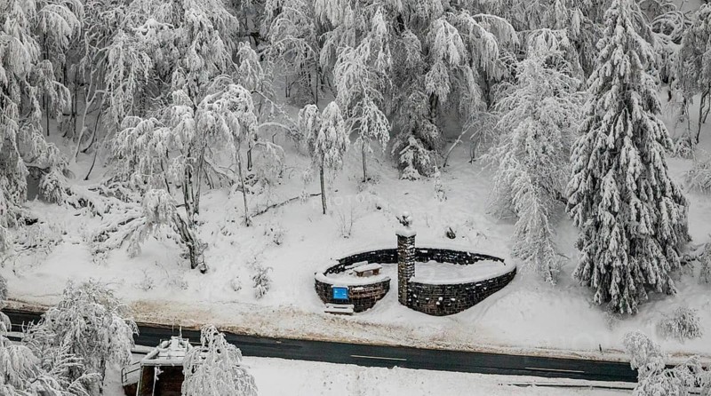 Aerial view of the snowy winter landscape of Winterberg below the Kahler Asten with snow-covered trees and firs in the Sauerland in North Rhine-Westphalia, Germany, Sauerland, Europe, aerial photo, birds-eyes view, aerial photography, aerial photography, overview, bird's eye view, lockdown, closed winter landscape, corona lockdown, deserted, snow, winter weather, corona-related lockdown, high heath in winter