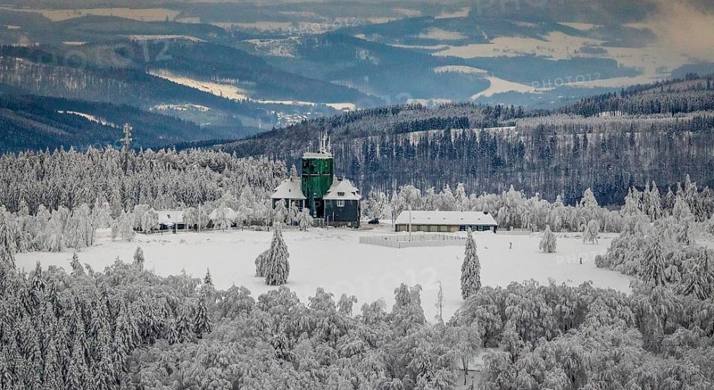 Aerial view of the snowy winter landscape of Winterberg am Kahlen Asten with Astenturm during Corona times in Sauerland in North Rhine-Westphalia, Germany, Sauerland, Europe, aerial view, birds-eyes view, aerial photography, aerial photography, overview, bird's eye view, lockdown, closed winter landscape, corona lockdown, deserted, snow, winter weather, corona-related lockdown, high heath in winter